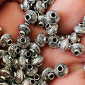 50 piece silver alloy  Bicone tribal spacer beads