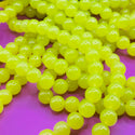 85 piece 10MM bead strand green yellow glow