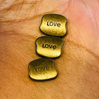 10 piece Love Word Bronze Beads