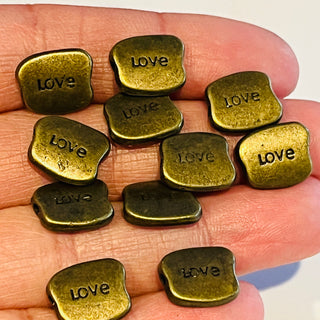 10 piece Love Word Bronze Beads